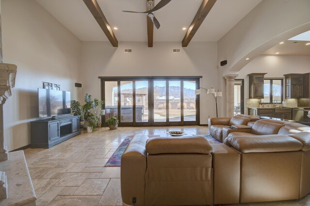 doorway to outside with a mountain view and plenty of natural light