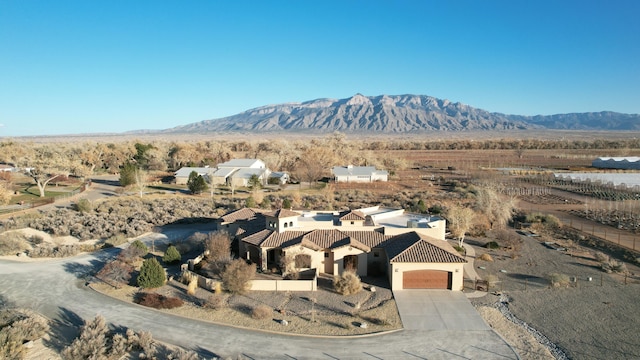 bird's eye view with a mountain view