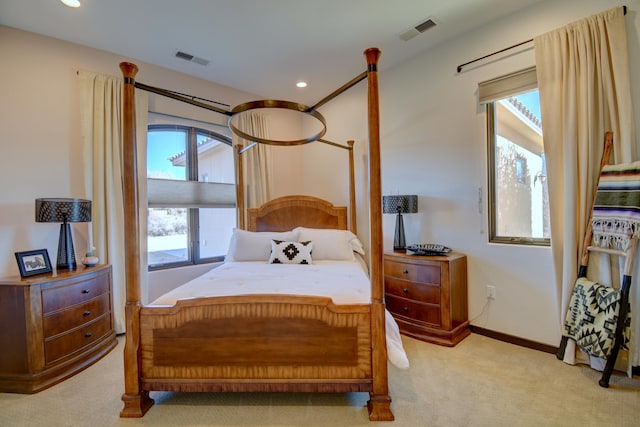 bedroom with light carpet, baseboards, visible vents, and recessed lighting