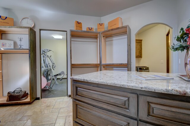 bathroom with stone finish floor