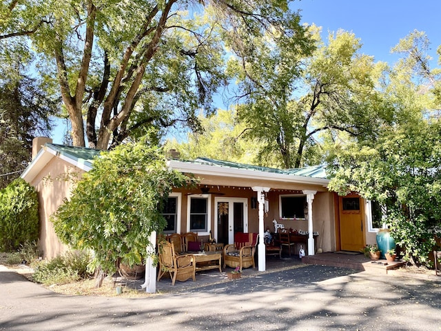 view of front of home with a patio