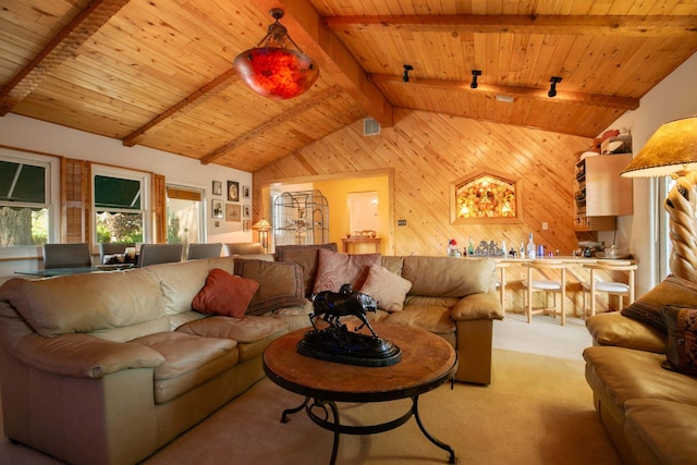 carpeted living room with vaulted ceiling with beams, wooden ceiling, and wood walls