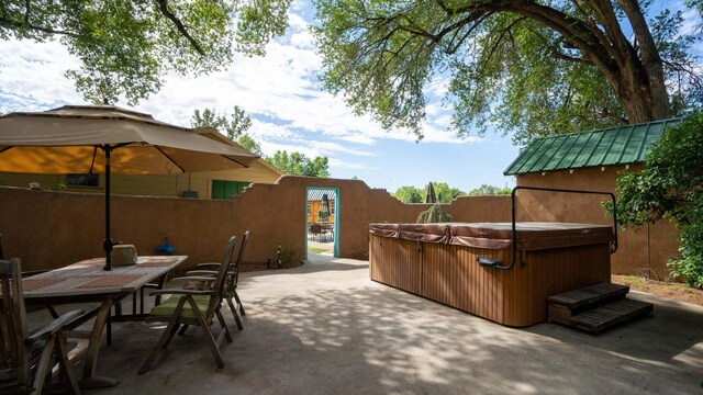 view of patio featuring a hot tub