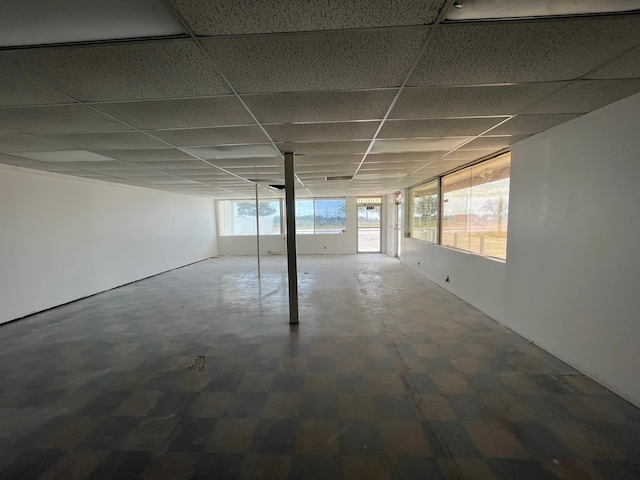 interior space featuring a paneled ceiling