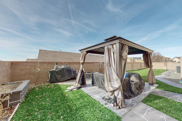 view of patio featuring a gazebo and grilling area