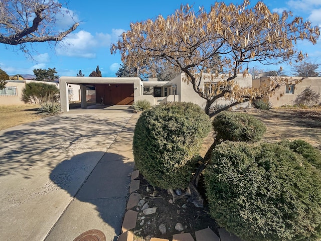 exterior space featuring a carport