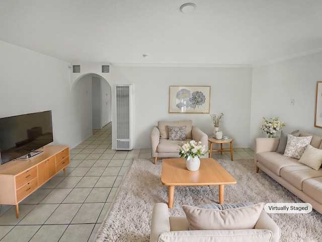 tiled living room with ornamental molding