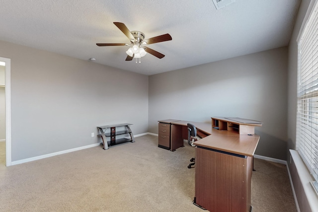 office with ceiling fan and light carpet