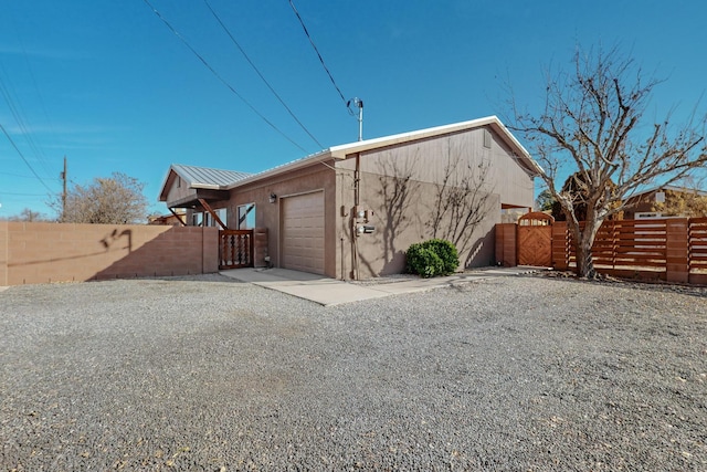 exterior space with a garage