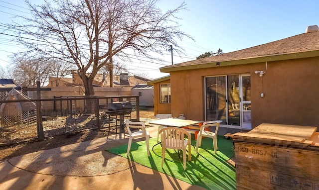 view of patio / terrace featuring area for grilling and a fenced backyard