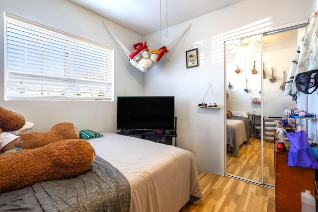 bedroom with wood finished floors