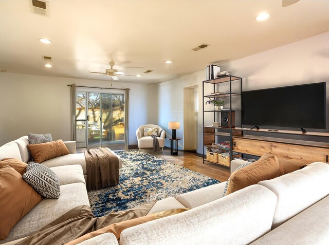 9006 Woodland Ave NE, Albuquerque, NM 87112 - living area featuring visible vents, recessed lighting, ceiling fan, and wood finished floors