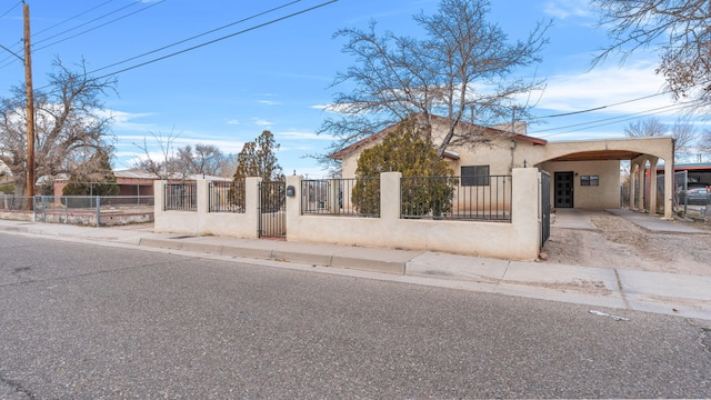 view of front of house featuring a carport