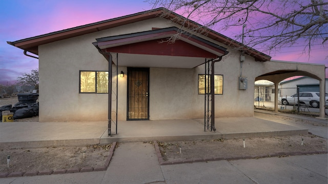 view of front of home featuring covered porch