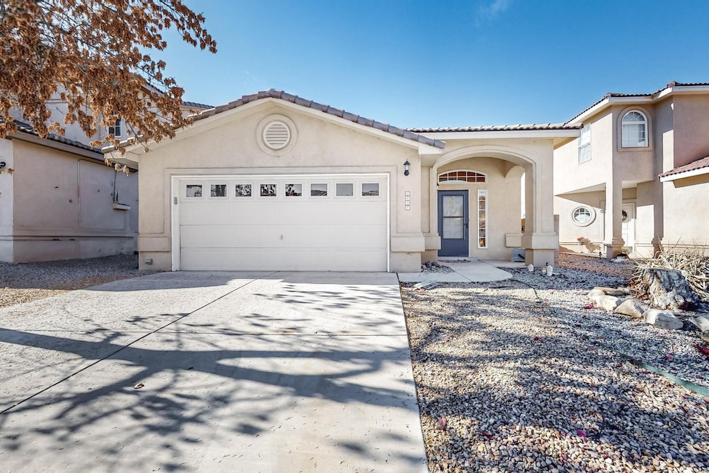 view of front of property featuring a garage