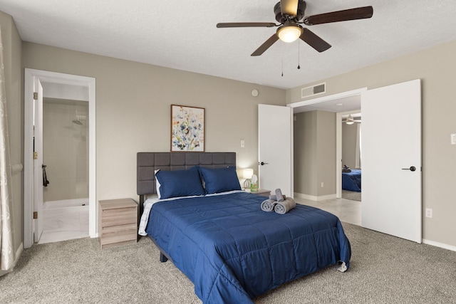 carpeted bedroom featuring ceiling fan, a textured ceiling, and connected bathroom