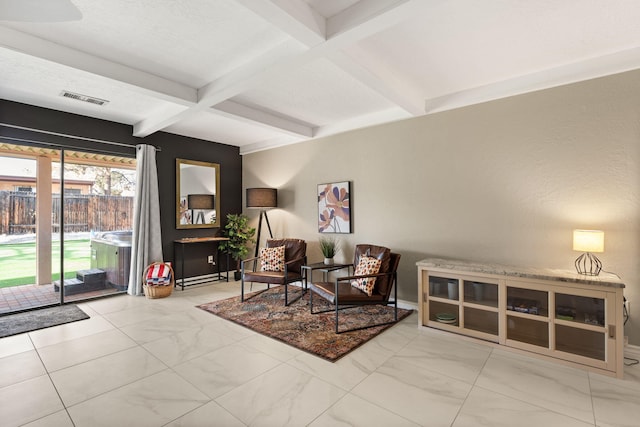 living area featuring beamed ceiling and coffered ceiling