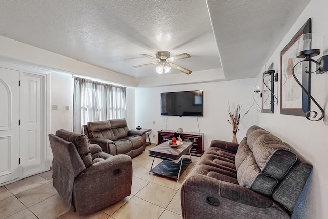415 Wheeler Ave SE, Albuquerque, NM 87102 - living room with light tile patterned flooring, a ceiling fan, and a textured ceiling