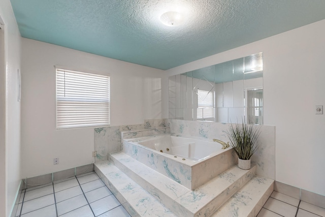 415 Wheeler Ave SE, Albuquerque, NM 87102 - full bathroom with a textured ceiling, a tub with jets, and tile patterned flooring