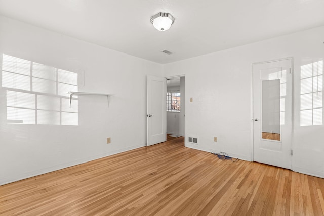 empty room featuring light hardwood / wood-style floors