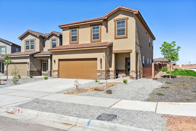 mediterranean / spanish-style house featuring a garage