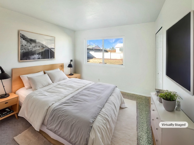 bedroom featuring carpet flooring