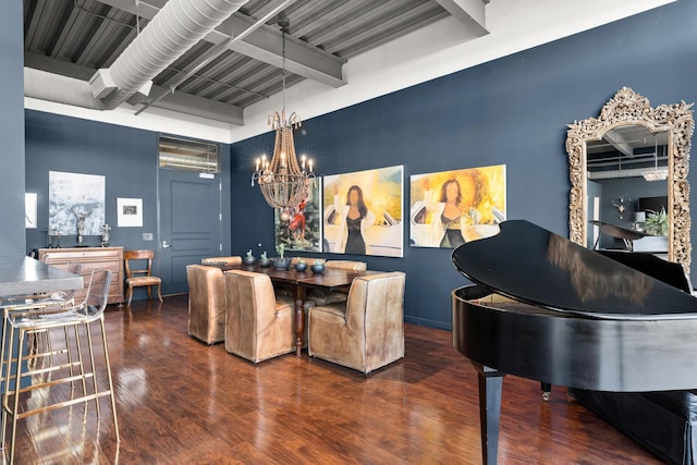 dining area with dark wood-type flooring, beam ceiling, and a chandelier