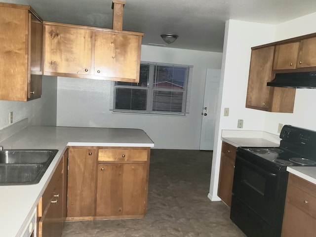 kitchen featuring sink and black range