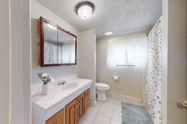 bathroom with tile patterned flooring, a textured ceiling, toilet, vanity, and a shower with shower curtain