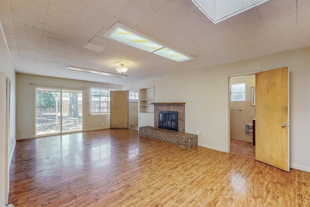 unfurnished living room featuring light hardwood / wood-style flooring