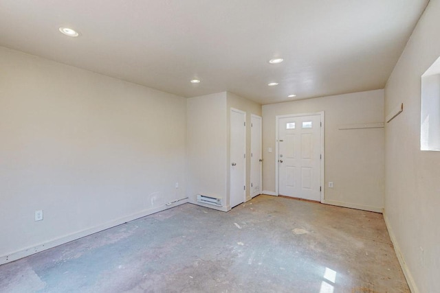 interior space with a baseboard radiator