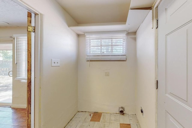 washroom featuring plenty of natural light and electric dryer hookup