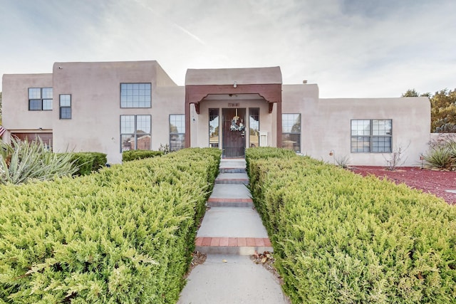 view of adobe home