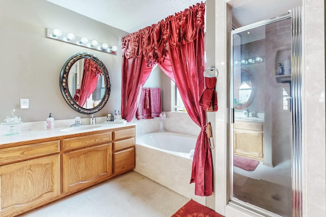 bathroom featuring vanity and plus walk in shower