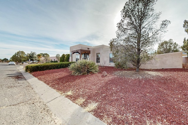 view of adobe home