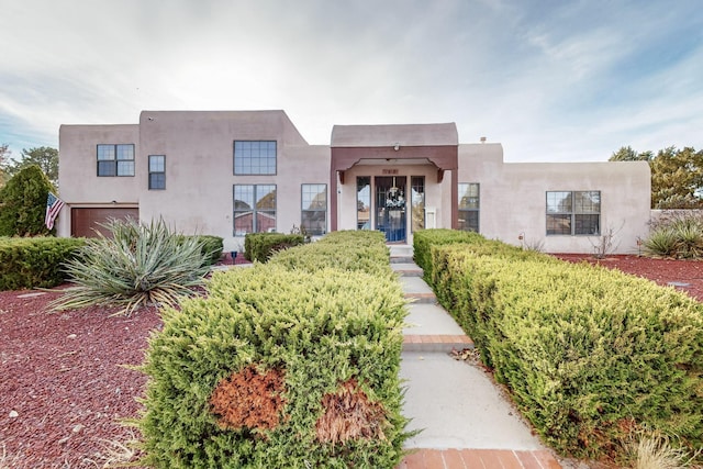 adobe home with a garage