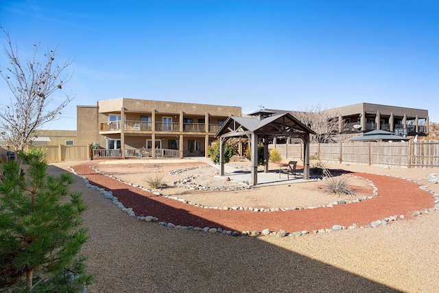 exterior space featuring a gazebo and a patio area