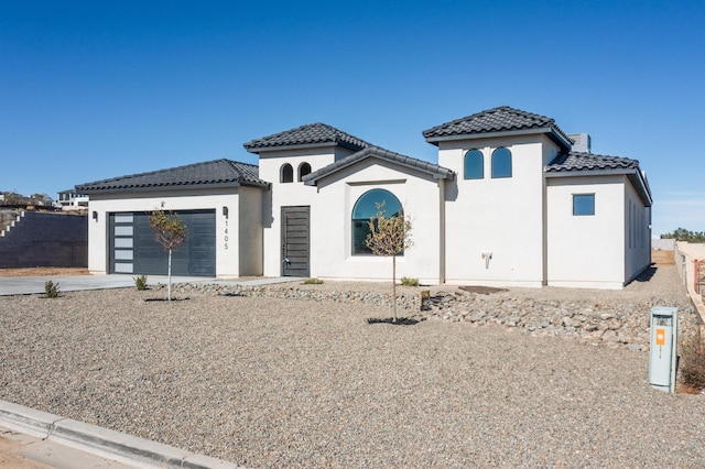 view of front of property featuring a garage