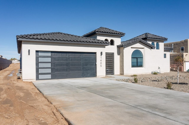 view of front of property featuring a garage