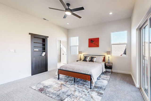 bedroom with ceiling fan and carpet