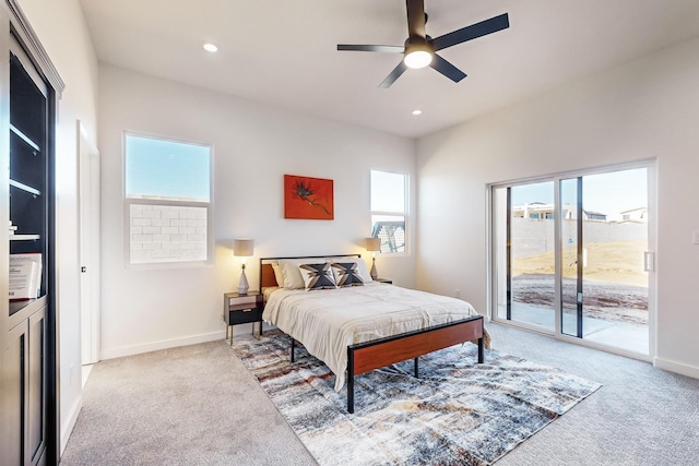 carpeted bedroom with access to outside and ceiling fan