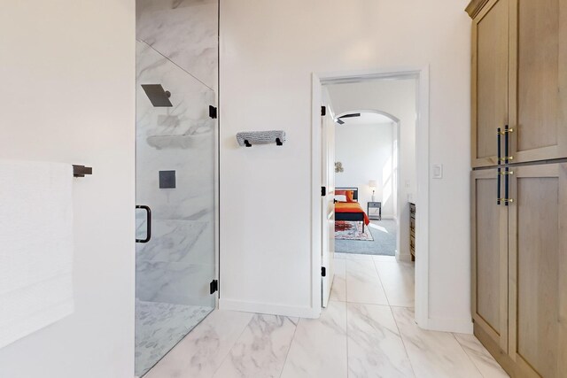 bathroom featuring an enclosed shower