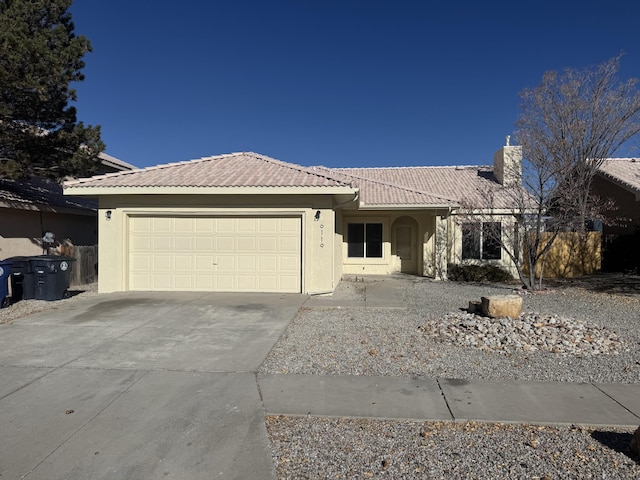 ranch-style home with a garage