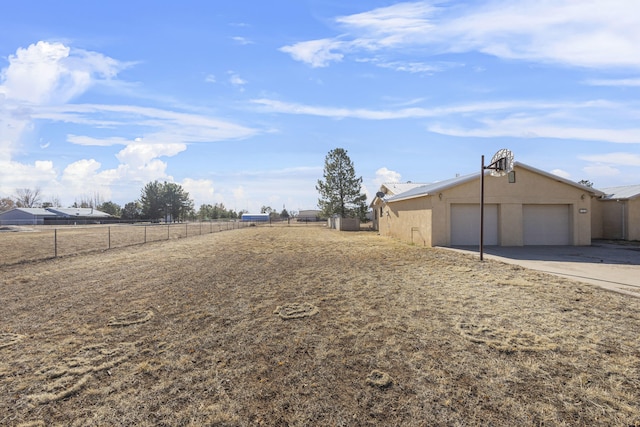 view of yard with a garage