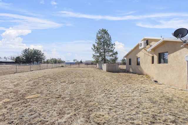 view of yard with a rural view