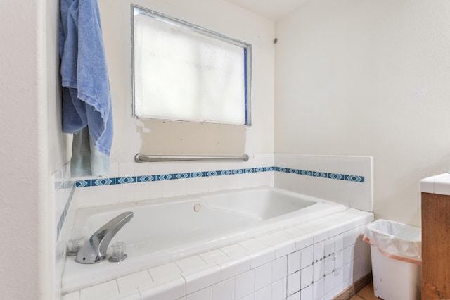 bathroom with tiled tub