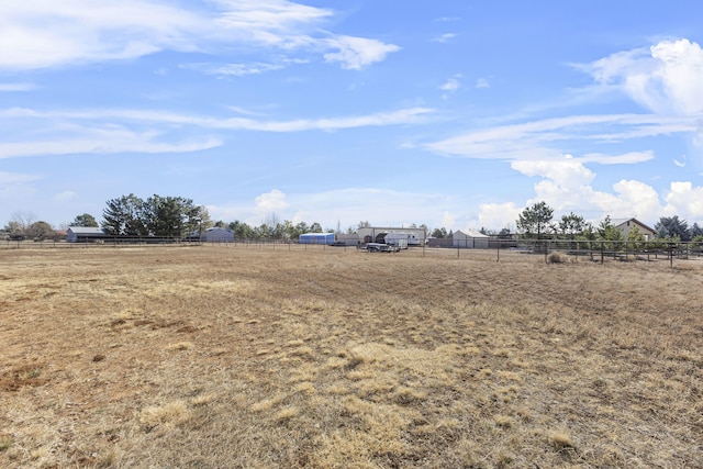 view of yard featuring a rural view