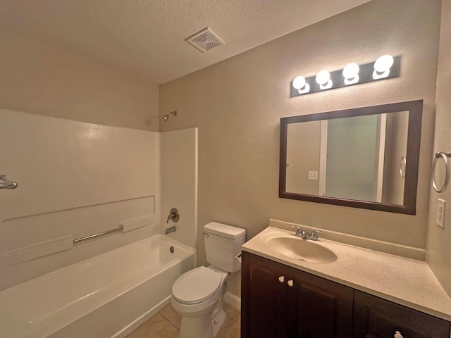 full bathroom featuring tile patterned flooring, shower / bath combination, a textured ceiling, toilet, and vanity