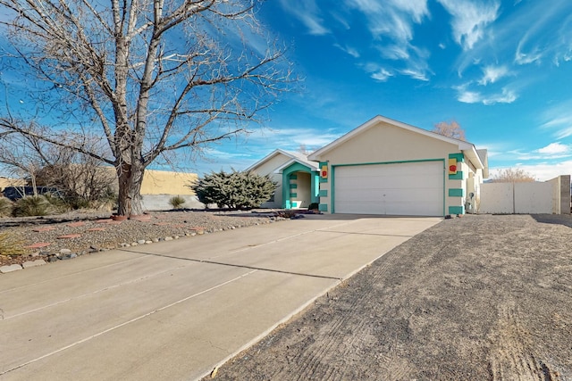 single story home with a garage