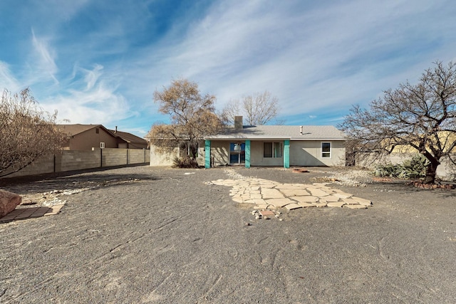 rear view of property featuring a patio area